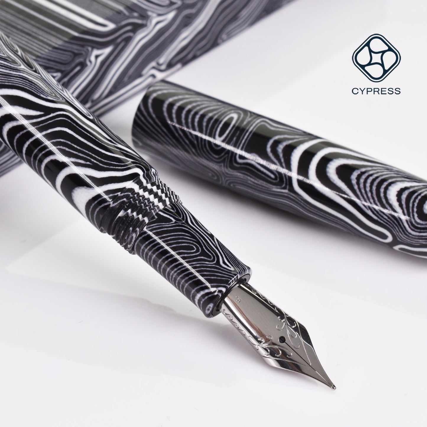 Cypress Black and White G10 with Steel Medium Nib